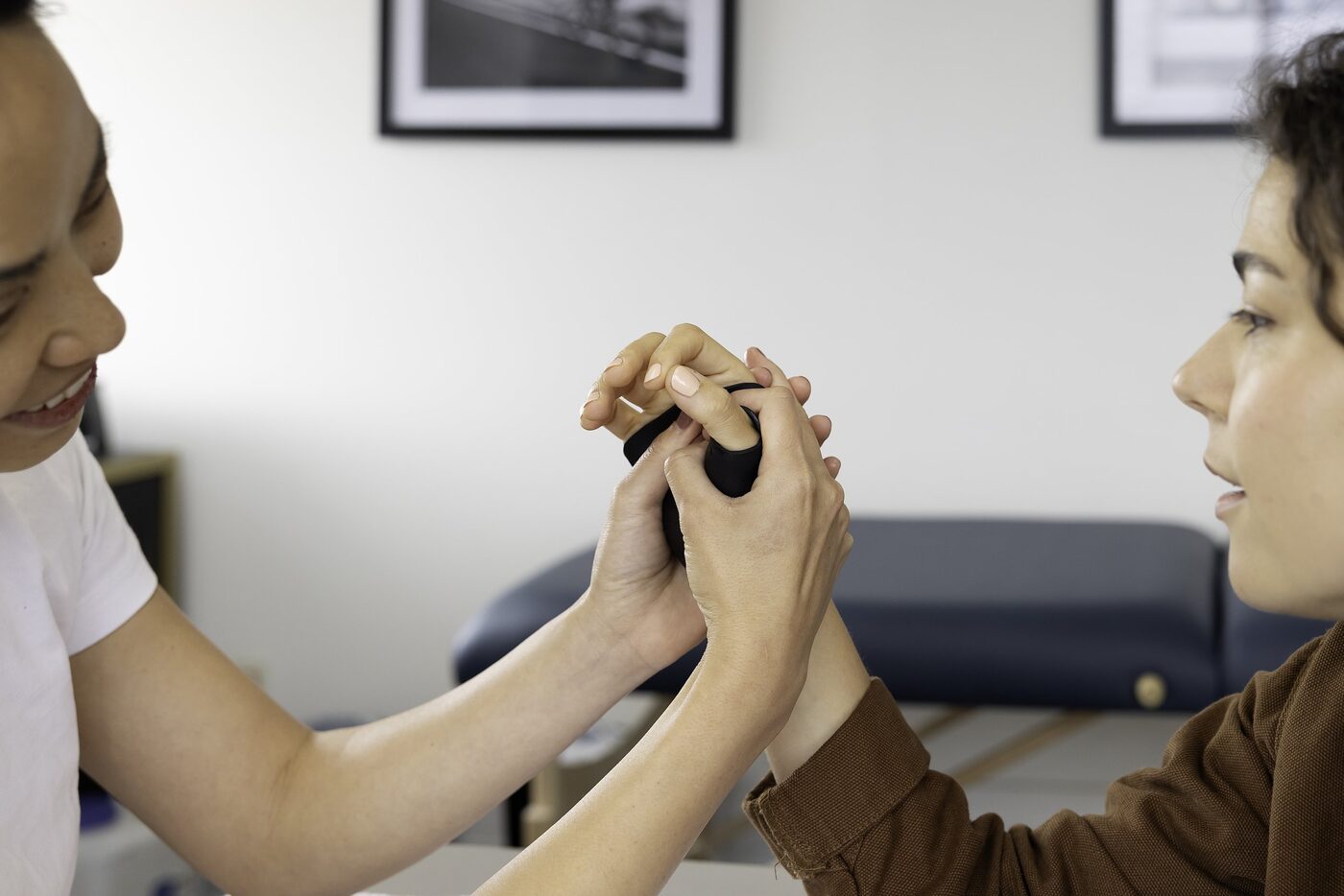 Jade Wong, Certified Hand Therapist, demonstrating expert upper extremity rehabilitation techniques